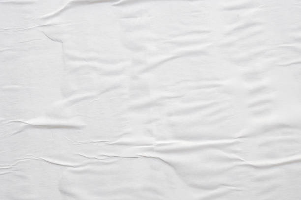 istock white crumpled and creased paper poster texture background 1419168325