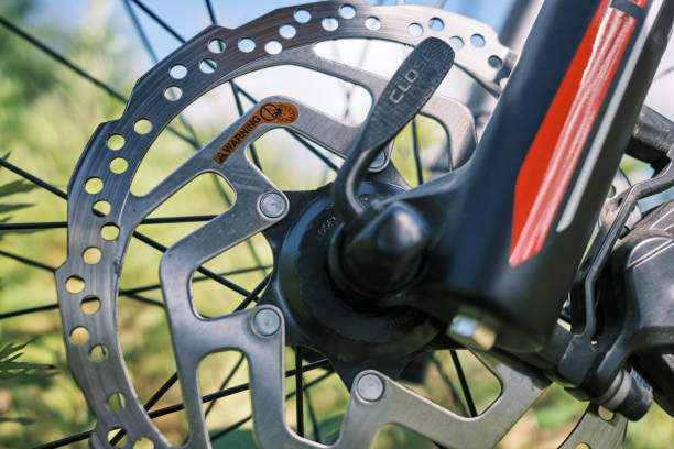 Wheel mounting lever and brake disc of a mountain bike close-up stock photo