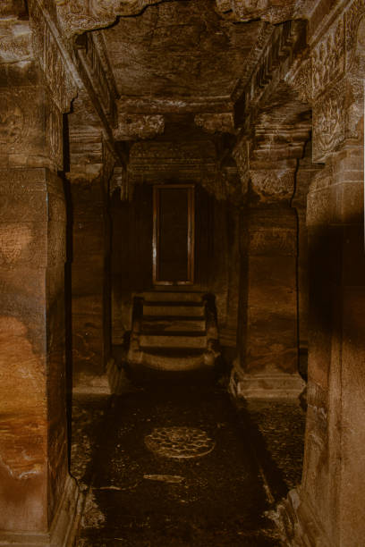 istock Badami cave temple entrance, with decorated pillars. 1419173688