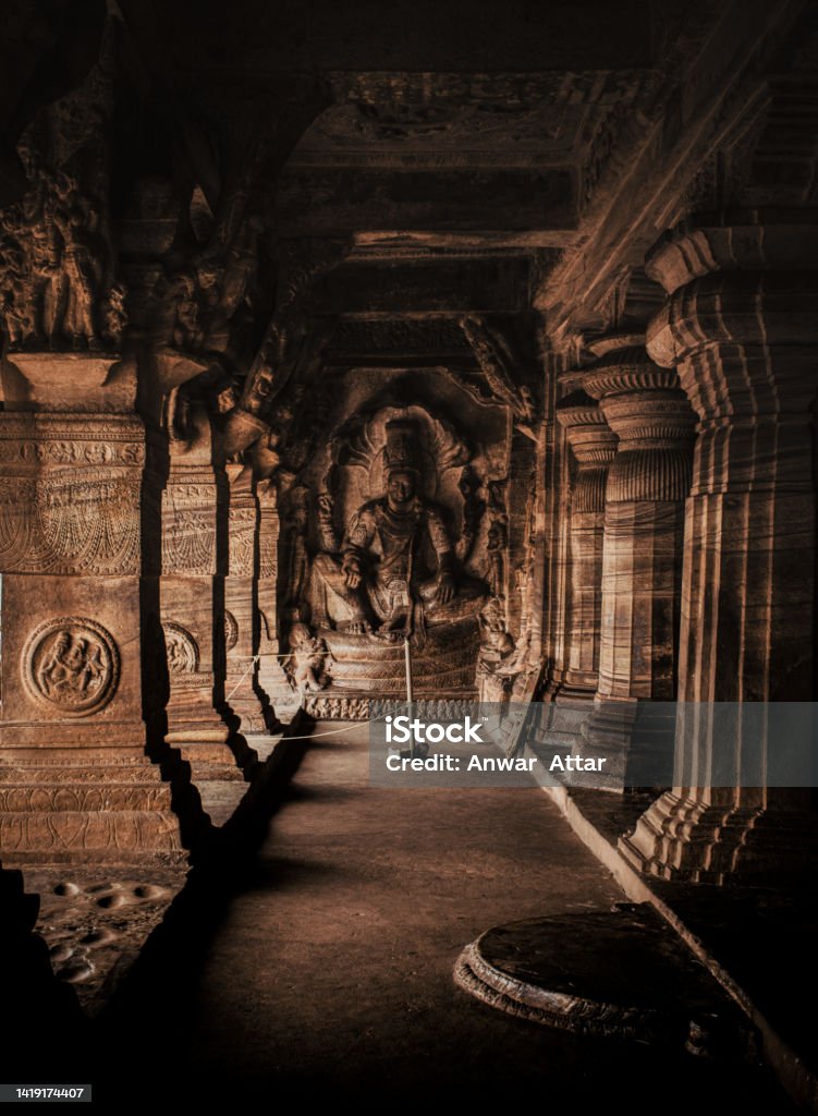 Interior look of Badami cave 3, is the largest and the most well-maintained cave out of the four rock-cut caves in Badami, Karnataka, India. This cave is dedicated to God Vishnu. Shiva Stock Photo