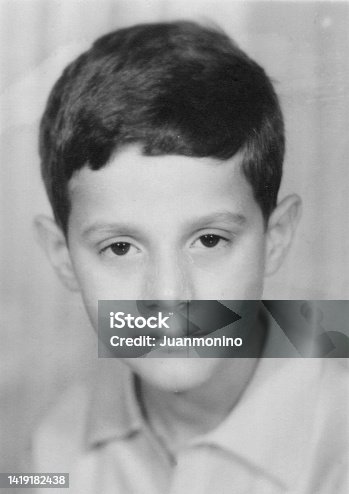 istock Image taken in the 60s: Studio headshot of a schoolboy 1419182438