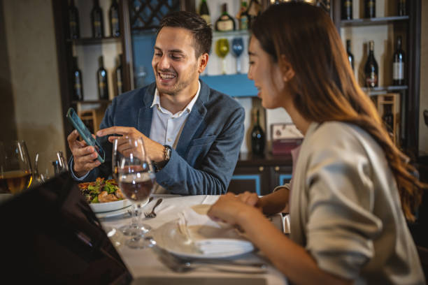 istock Multiracial business couple in a restaurant 1419215731