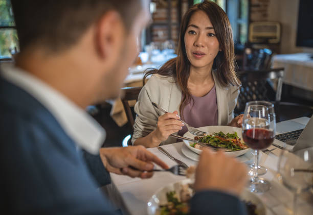 istock Multiracial business couple in a restaurant 1419215857