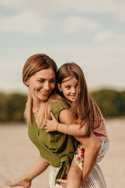 istock Playful mom and daughter time 1419219170