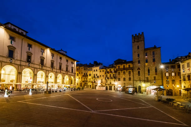 Walking Arezzo city streets. View of The Basilica of San Domenico central facade.
