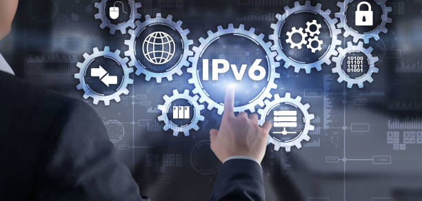 IPv6. Businessman pressing touch screen interface and select icon Internet Protocol stock photo