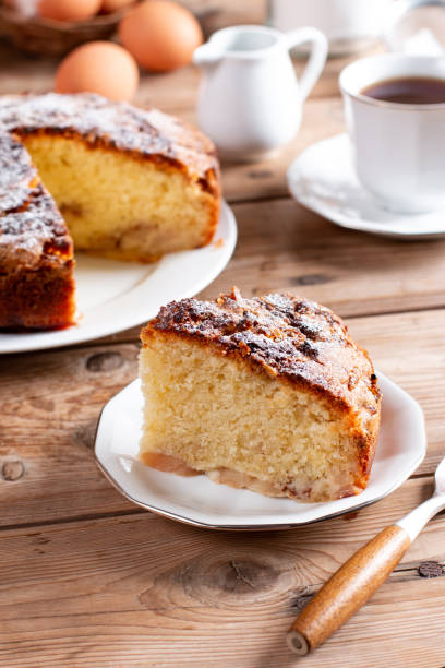 istock Sponge cake or chiffon cake with apples, so soft and delicious with ingredients on table. Homemade bakery concept for background and wallpaper. 1419225817