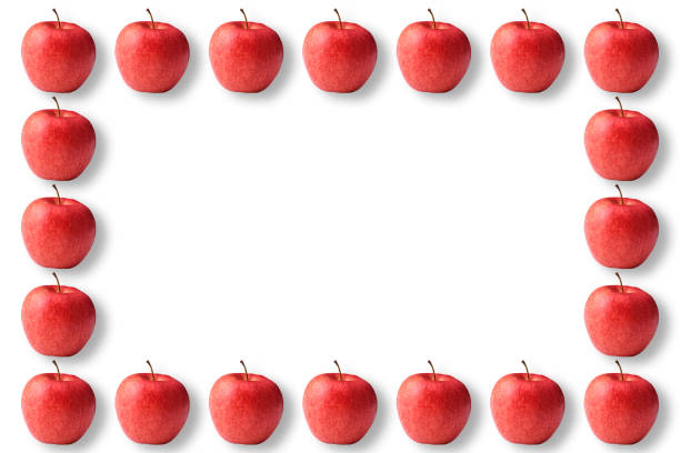 Overhead shot of  red apple frame on white background.