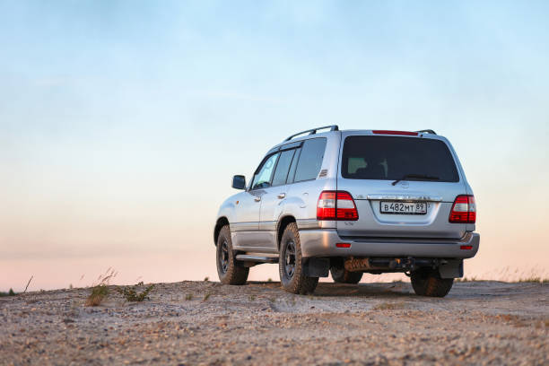 Novyy Urengoy, Russia - August 5, 2022: Offroad car Toyota Land Cruiser 100 at a countryside.