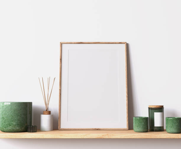 istock Modern poster frame mockup, minimal room design on white interior background, wooden frame mock up 1419233815
