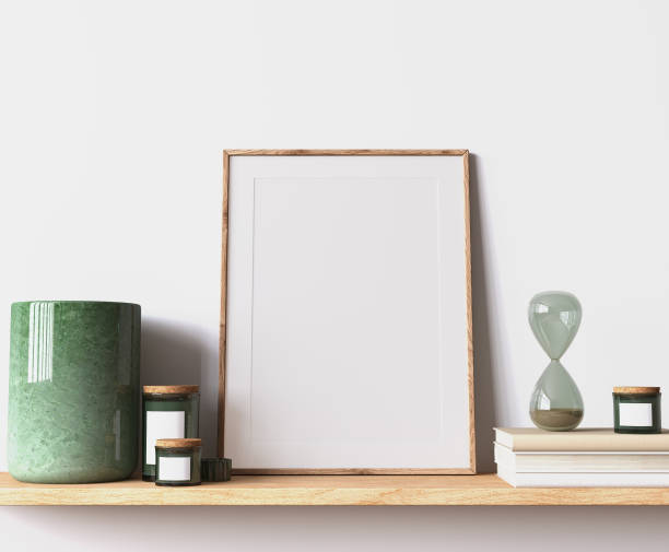 istock Modern poster frame mockup, minimal room design on white interior background, wooden frame mock up 1419233847
