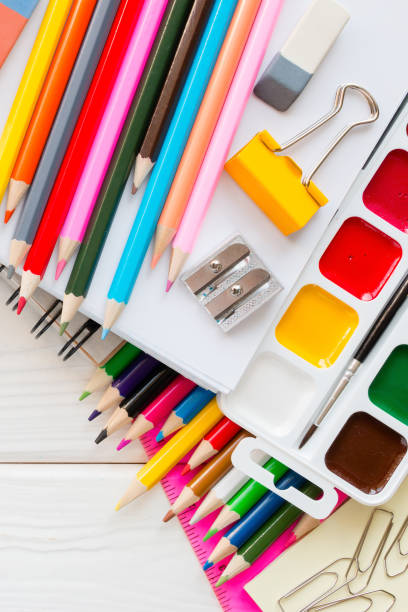 istock School stationery on a white wooden background and space for text 1419236714