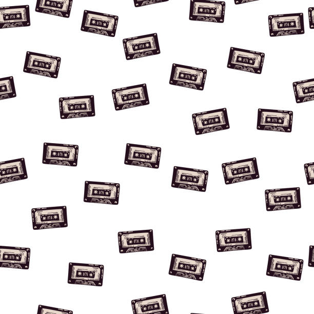 istock Audio cassette tape engraved seamless pattern. Vintage music cassette tape in hand drawn style. 1419240816