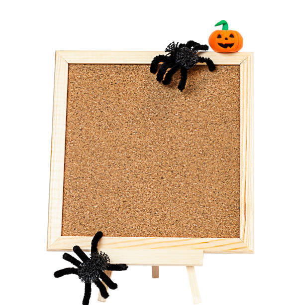 istock blank visual board with spiders and pumpkin on white background close up 1419240910