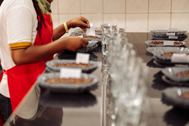 istock Woman placing notes on plates with coffee for tasting 1419243344