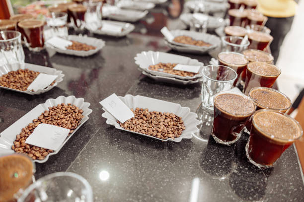 istock Coffee glasses and beans on table ready for a tasting indoors 1419244927