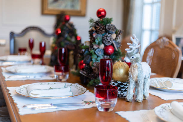 istock General view of empty Christmas dinner table, empty Christmas table during Pandemic, Christmas themed dining table, decorated Christmas tree and wooden deer and christmas decorations on dining table 1419244967