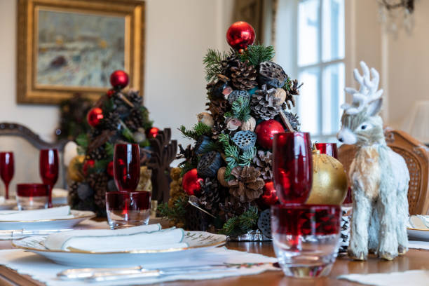 istock General view of empty Christmas dinner table, Empty Christmas table during Pandemic, Christmas themed dining table, decorated Christmas tree and wooden deer and christmas decorations on dining table 1419244971