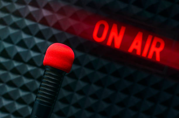istock Professional microphone and on air sign 1419245189