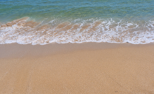 Natural background of white sand beach on island, Summer beach background. Sand and sea and sky