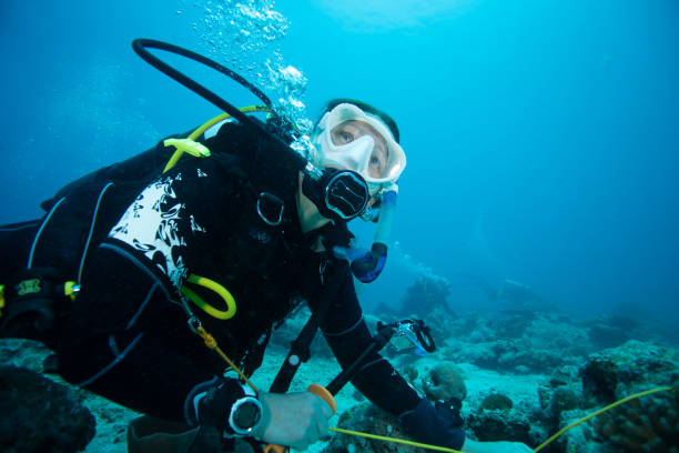 istock Female diver on ocean floor 1419247159
