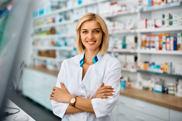 istock Portrait of confident female pharmacist looking at camera. 1419248821