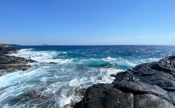 istock Wild waves and foam of the ocean 1419254542