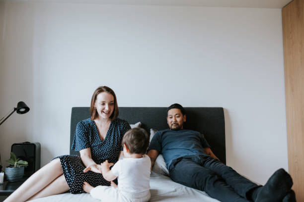 istock Young Family spending time together at home 1419257484