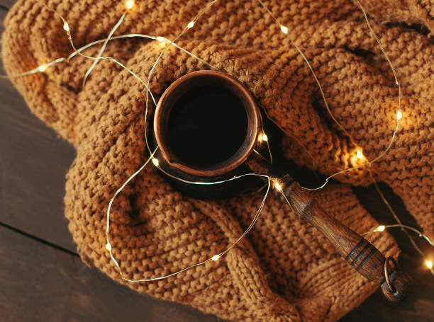 istock Autumn mood composition on a wooden table with cup coffee.  wooden background 1419260437