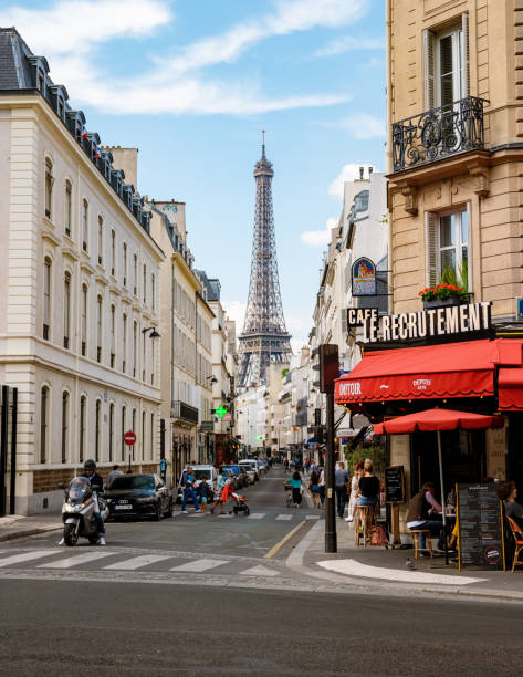 Paris France people drinking coffee on the terrace of a cafe restaurant during the Autumn Paris France September 2021, people drinking coffee on the terrace of a cafe restaurant during the Autumn end of summer. french restaurant pictures stock pictures, royalty-free photos & images
