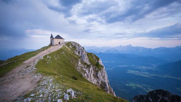 A beautiful mountain landscape at the Dobratsch in Austria A beautiful mountain landscape at the Dobratsch in Austria with a chapel and hiking trails villach stock pictures, royalty-free photos & images