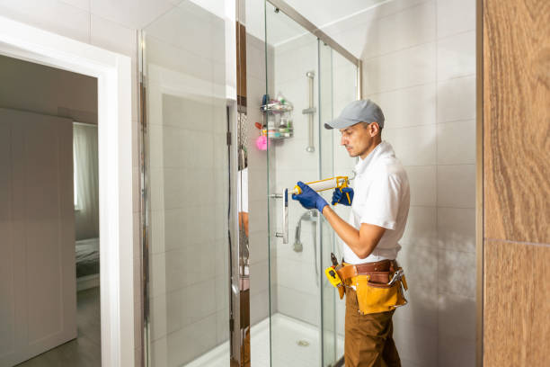 istock Young plumber fixing shower cabin 1419262686