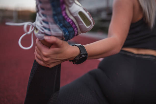 istock Close-up of a woman's hand wearing a smart watch while doing stretching exercises 1419262696