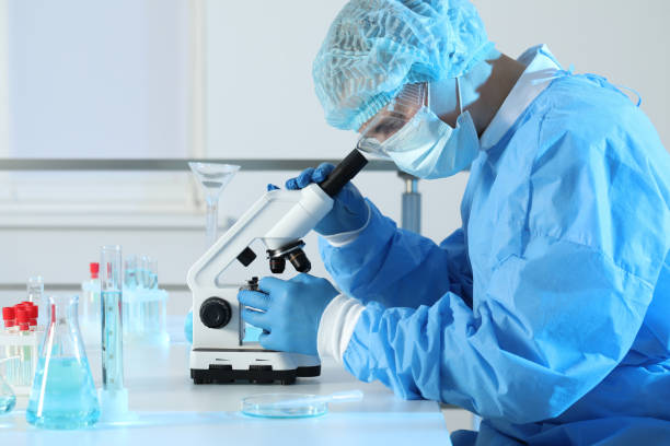istock Scientist working with microscope in laboratory. Medical research 1419266072