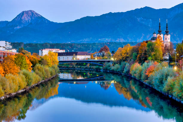 River Drava View of the River Drau, Villach villach stock pictures, royalty-free photos & images