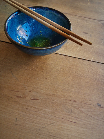 fresh japanese food with chopstick on a table at a restaurant