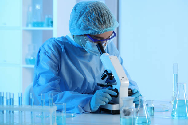 istock Scientist working with microscope in laboratory. Medical research 1419267893