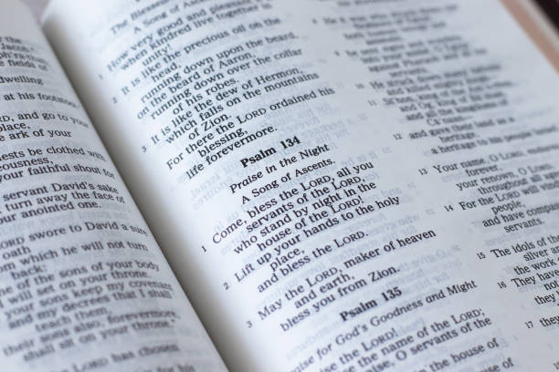 istock Psalm 134 verse in an open Holy Bible Book 1419270204