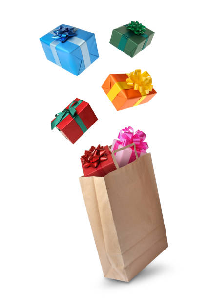 istock Many different gift boxes falling into paper shopping bag on white background 1419272539