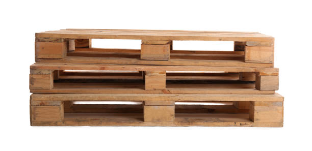 istock Stacked wooden pallets isolated on white. Transportation and storage 1419277303