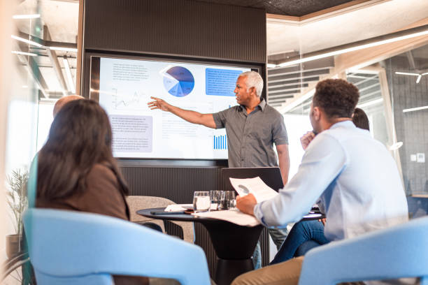istock Senior manager giving a presentation in the office 1419279053