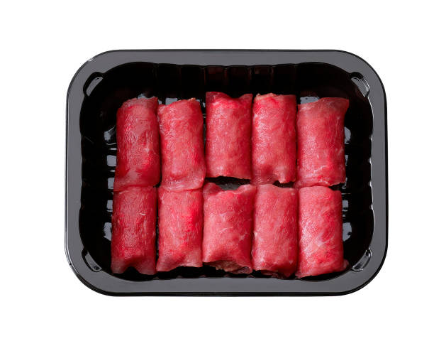 istock Package of raw meat roll slavink isolated on white background 1419281357