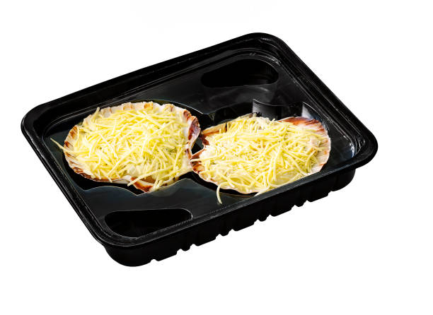 istock scallop in black plastic tray isolated on white with clipping path 1419281878