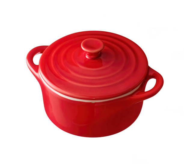 istock red cast iron enamel frying pan. Dutch oven, isolated on white 1419281964