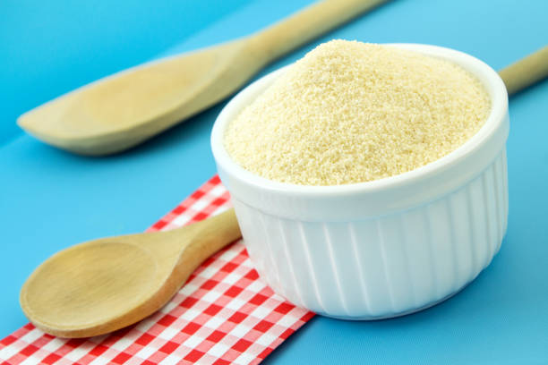 Soft Wheat Semolina flour and bowl close up