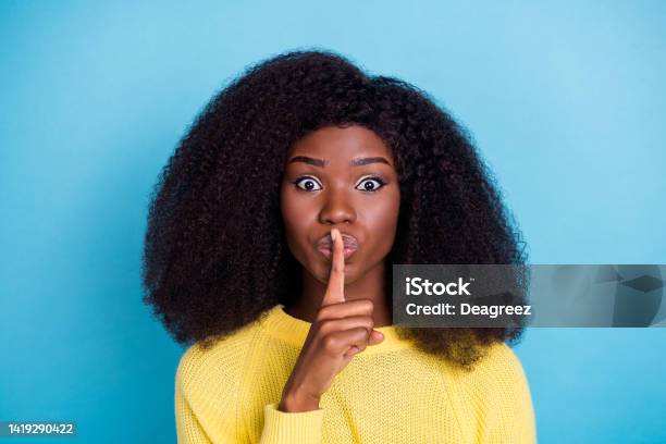 Photo Of Gorgeous Lady Hand Finger Cover Mouth Touch Lips Not Speak Show Shut Up Symbol Isolated On Blue Color Background Stock Photo - Download Image Now
