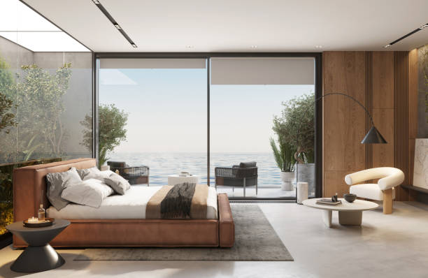 istock Digitally generated image of luxurious resort bedroom with sea view 1419292194