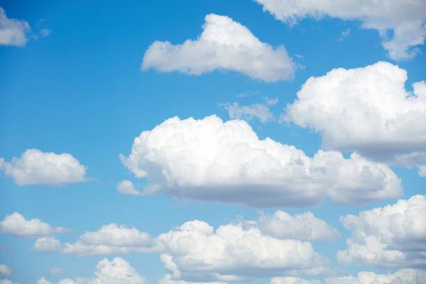 istock Blue skies with summer cumulus clouds. 1419292621