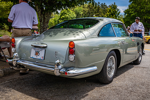 Highlands, NC - June 11, 2022: Low perspective rear corner view of a 1965 Aston Martin DB5 Hardtop Coupe at a local car show.