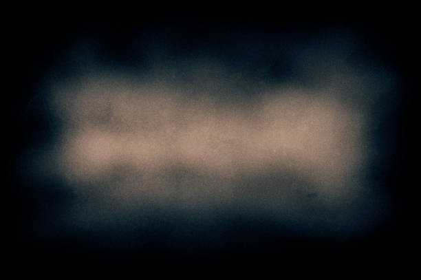 Spot of the grainy surface of an old photographic film. Spot of the grainy surface of an old photographic film. Vintage. Web banner. film reel stock pictures, royalty-free photos & images